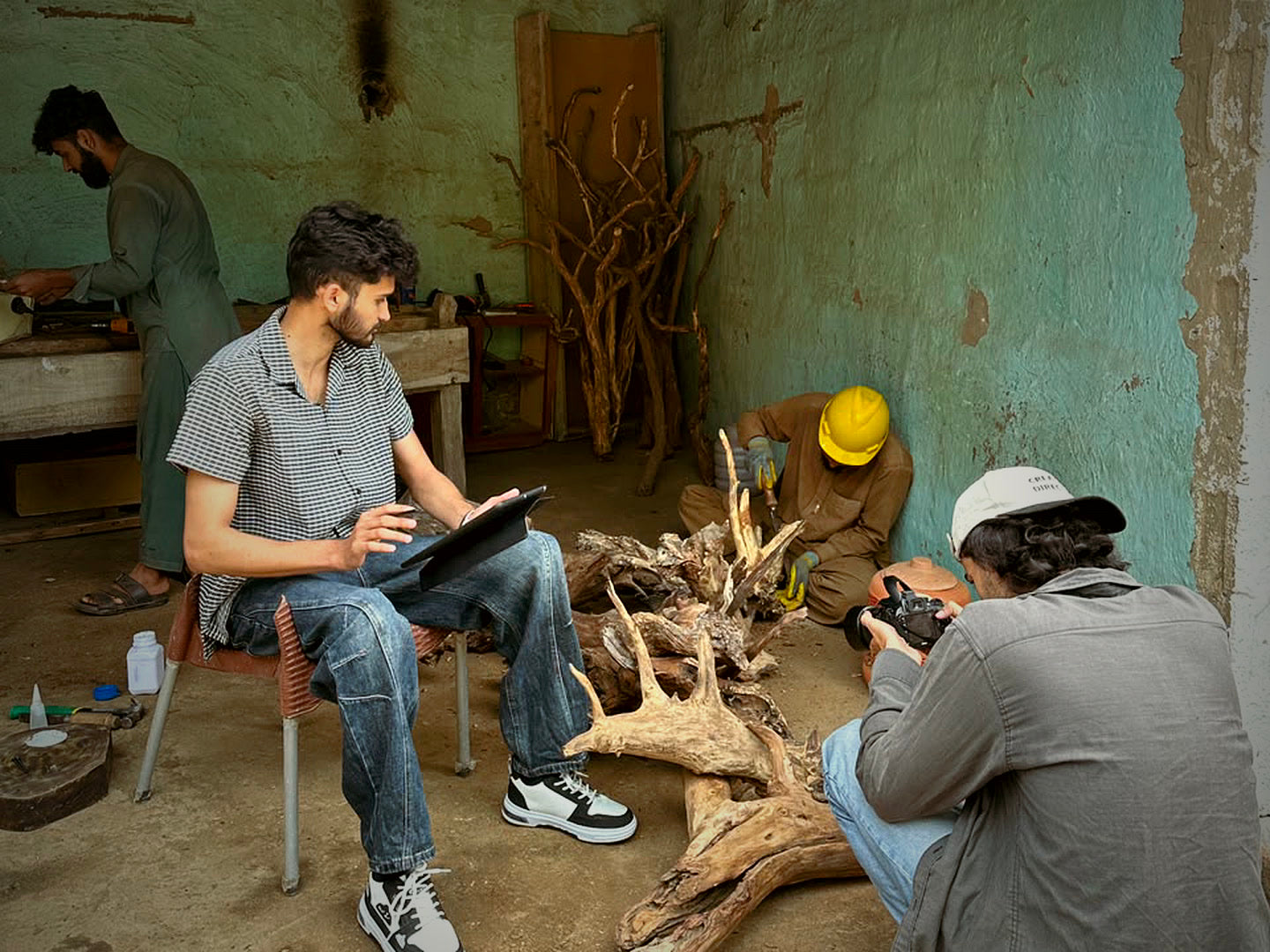 The three of us in the workshop — where every 3 Tree piece starts as a raw mountain root.
